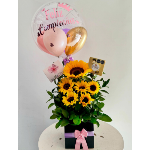 Arreglo floral de girasoles, chocolates - floristeria cali